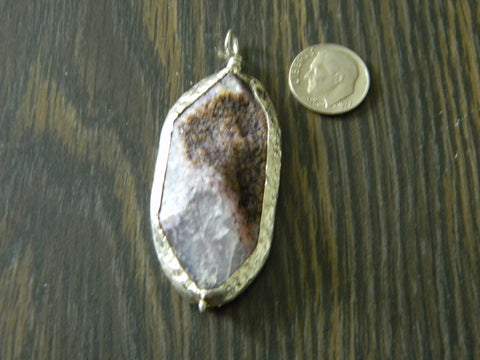 encased stone pendant