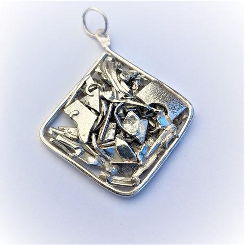 Recycled sterling silver Siquieros-inspired pendants